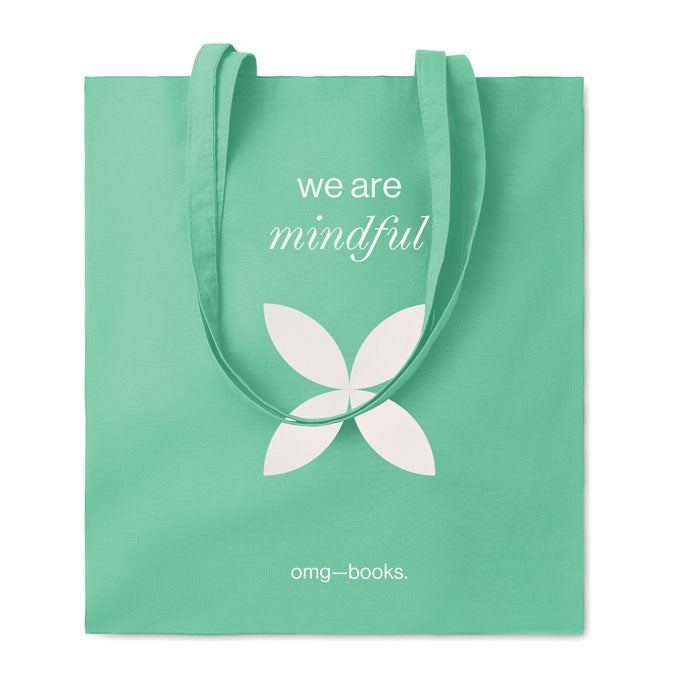 Bolsa de algodón verde menta con un logo impreso de ejemplo